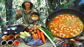 Put Shrimp,Squid,Ginger,egg,potato,carrot in Spicy Seafood Compoy Broth Red Soup