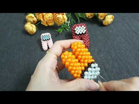 Beaded Anong Us character in the game 2/2# Perlé Anong Us personnage dans le jeu#Kết cườm  Anong Us