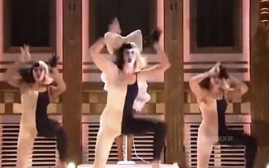 A woman who’s conquered the world with her talent—she never shows her face when she sings, but you’v