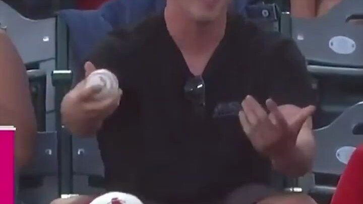 After receiving the ball, the man passed it to the boy, who promptly returned the favor.