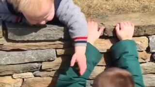 The enthusiastic younger brother is eager to help...