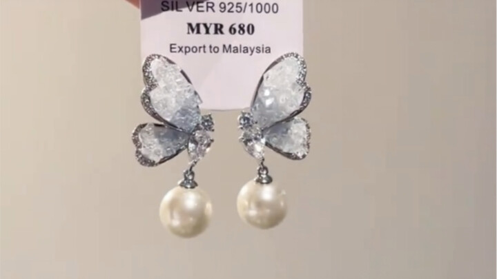 A breathtaking beauty, a frost-kissed, ethereally serene half‑butterfly of winter…