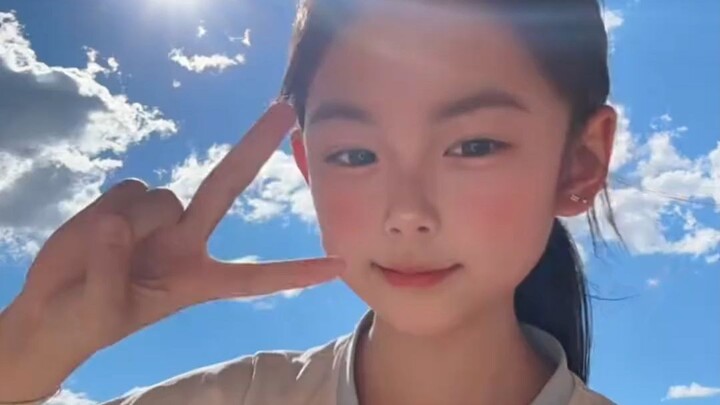 Beautiful Girl Against a Blue Sky and White Clouds ~ [Sonia^]