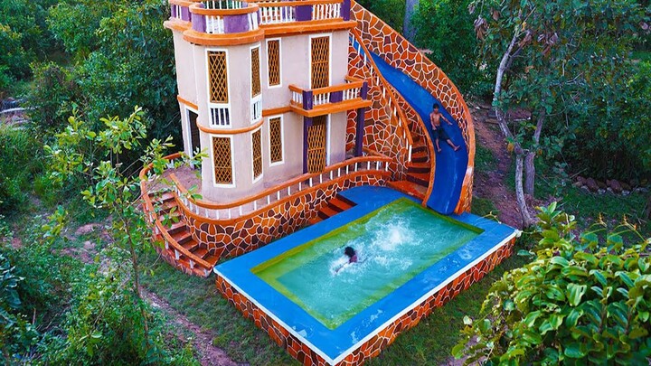 الأخ الصغير في البرية يبني بيده في الهواء الطلق، ويقيم فيلاً من العدم، ما أروع هذه المهارة! (النسخة 