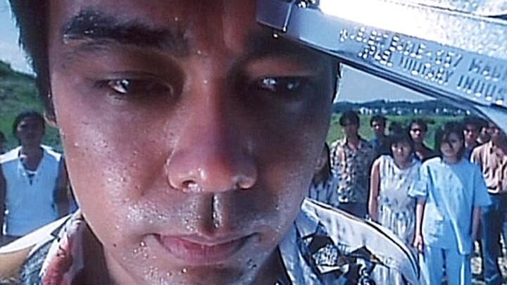 A Hong Kong thug, despite having a gun pointed at his head, still upheld the rules of the Hung Mun s