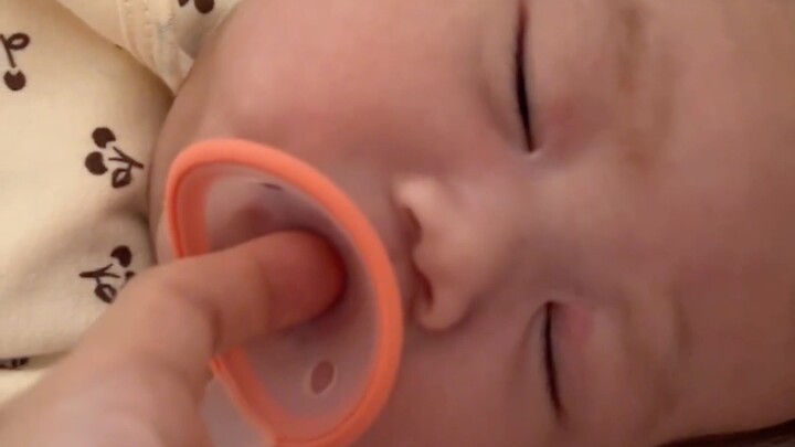When I put my hand into the baby's pacifier...
