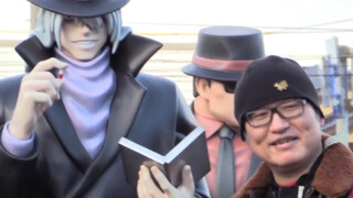 Gosho Aoyama attends the unveiling ceremony of the Gin & Vodka statue