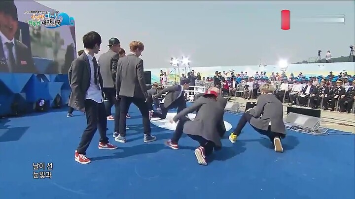 This live performance is rare; it seems to be at a military port. EXO’s “Growl.”