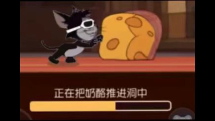 A black rat is helping you push the cheese.