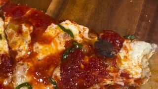 ASMR: Pizza with an incredibly crispy crust.