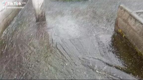 lluvia torrencial granizo campiña del inca Quito Pichincha Ecuador..