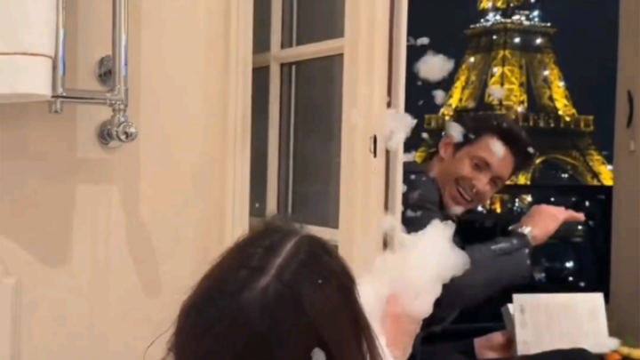 A Romantic Kiss Beneath the Eiffel Tower in Paris