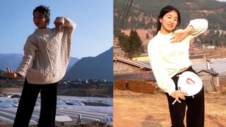 女孩背靠荒山跳古典舞，舞姿优美大方气质惊艳众人，美得像幅画