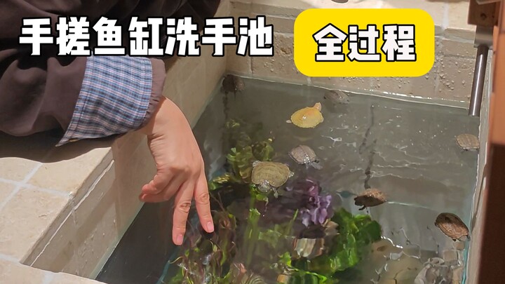 My husband built a fish tank–style sink, initially for storage.