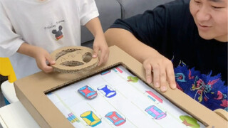 用快递纸箱自制疯狂的赛车玩具，爸爸和孩子抢着玩