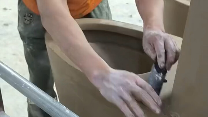 The toilet manufacturing process: raw clay enters the kiln and undergoes a transformative ceramic fi