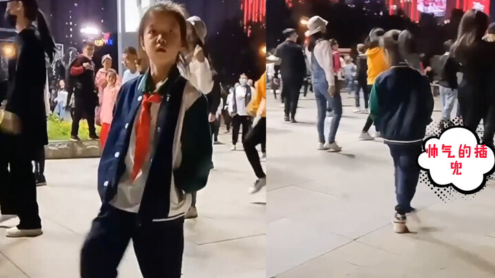 She’s got the poise down to a T! 7-year-old girl becomes a square dance pro, confidently with hands 