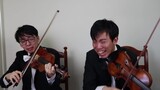 [Music]Two violinists playing the violin part in <The Blue Danube>