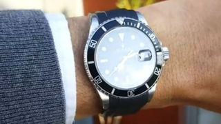 Rolex Submariner 16610 from 1997 with Zealande rubber strap