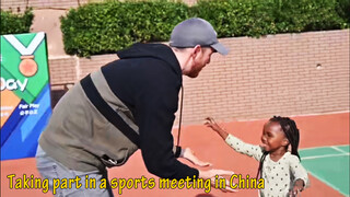 An American Family to See Daughters Play Sports in China. It's Adorable!