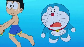 Nobita uses bait to guide fish to an uninhabited island