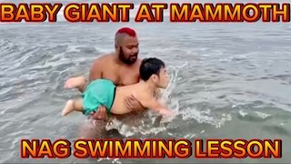 MAMMOTH AT BABY GIANT NAG SWIMMING LESSON