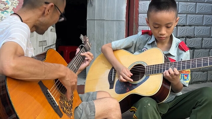 เล่นกีตาร์ร้องเพลงยามเย็น