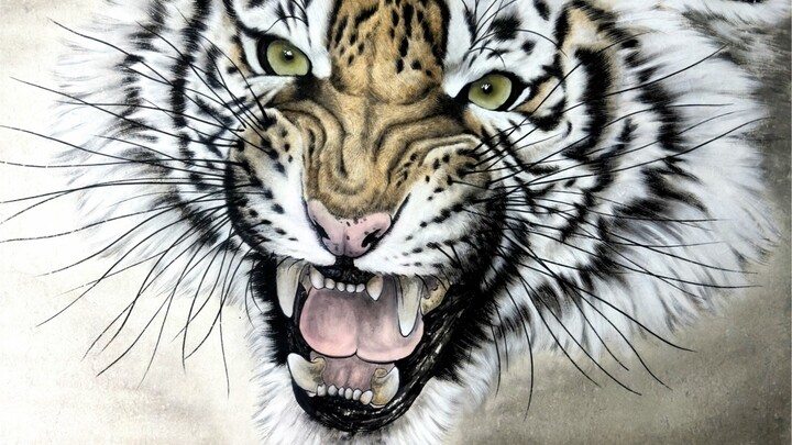A heart of a tiger, yet it gently smells the roses.