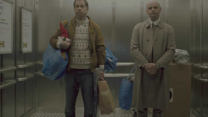 What happens when two strangers are trapped in an elevator?