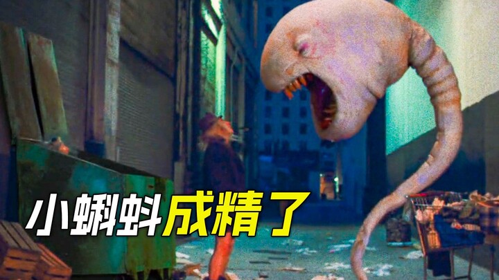 Pria tersebut menyemburkan kecebong raksasa, yang ukurannya lebih tinggi dari gedung.