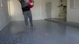 Garage floor construction—does anyone know what material is used here?