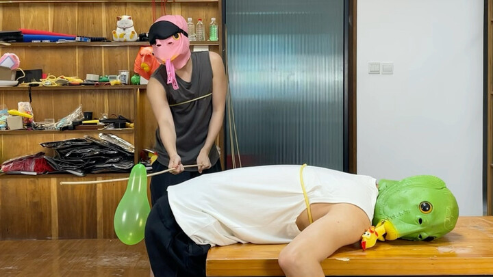 Hurry up and get your friends to watch the blindfolded balloon-popping challenge!