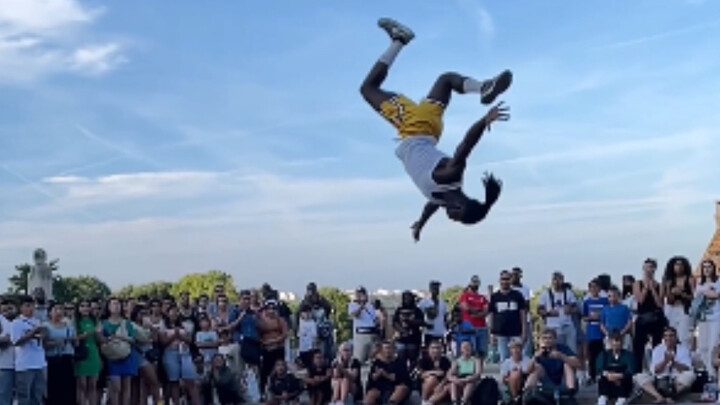 This black guy is about to take flight—his backflip is way too high!