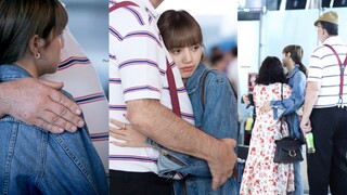 Lisa went on a trip with her family at the Thai airport. Before leaving, Lisa was hugging her father