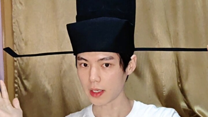 قبعة مينغ المفتوحة الأقدام