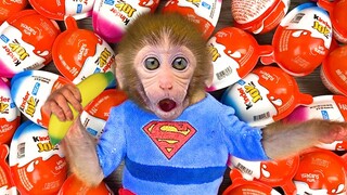 Monkey Baby Bon Bon and puppy open Yummy Kinder Surprise Egg contain toys and chocolate