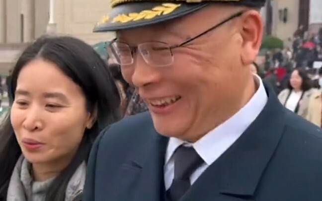 When asked if the Type 004 is nuclear-powered, why did he smile even more?