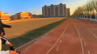 The coach takes the field himself! Leading the final 200 meters of the 400!