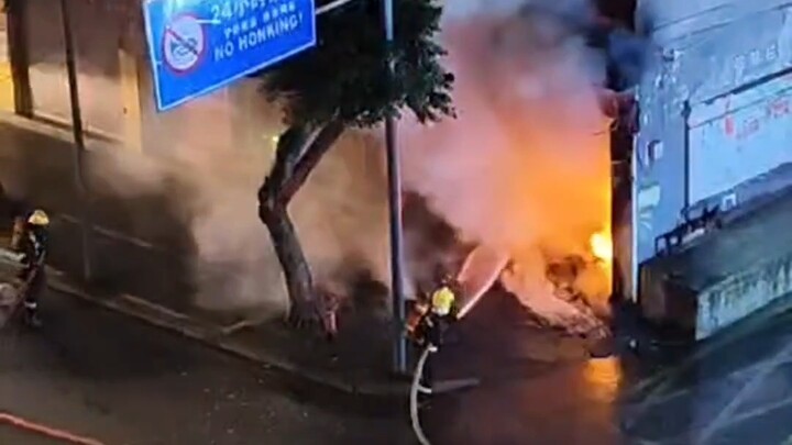 Chinese firefighters at a fire scene (repost)