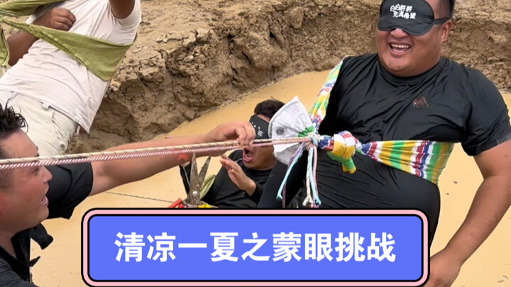 Cool Summer Fun: Blindfolded Rock-Paper-Scissors Challenge Over a Puddle!