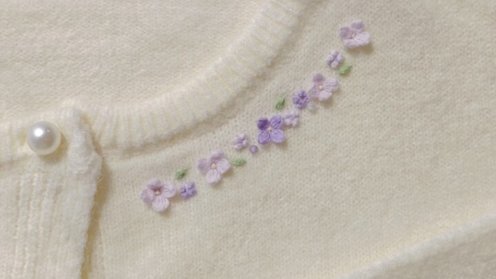 Teaching you how to embroider on a sweater—sweet lilac floral trim for the neckline!