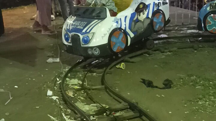 pasar malam, senyum si kecil manis.  memorabilia