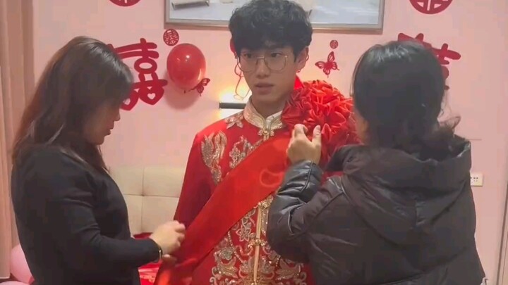 The groom who’s about to become a son-in-law looks completely bewildered.