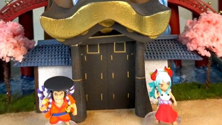 Use small items from the 2-dollar store to make a backdrop for the figurine!