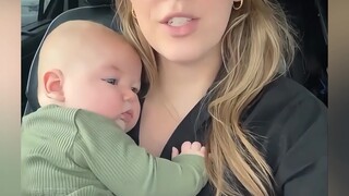 The cute baby makes the mother love him.