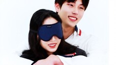 What is a girl's reaction when she is blindfolded and hugged from behind by a handsome guy?