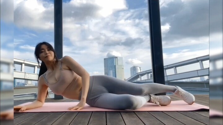 Yoga beauty with a great figure—leg workout!