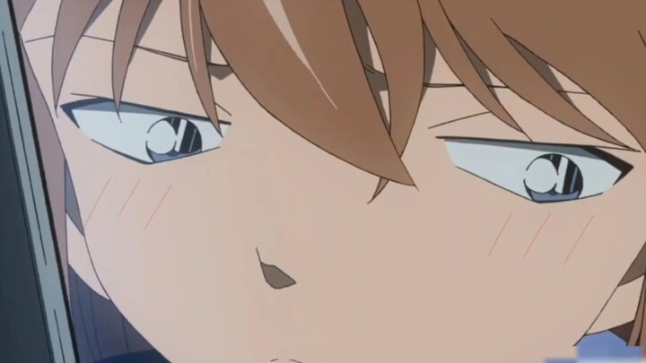 Why did Ai Haibara blush during her late-night phone call with Conan?