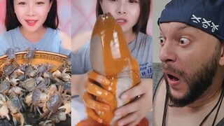 Video wanita Tiongkok makan kepiting membuat orang asing tercengang?