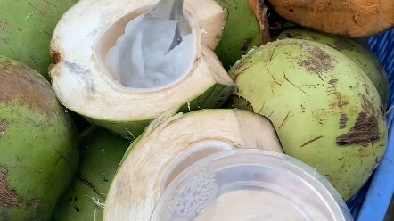 Performing a three-knife coconut-chopping act—using jelly as the coconut meat!